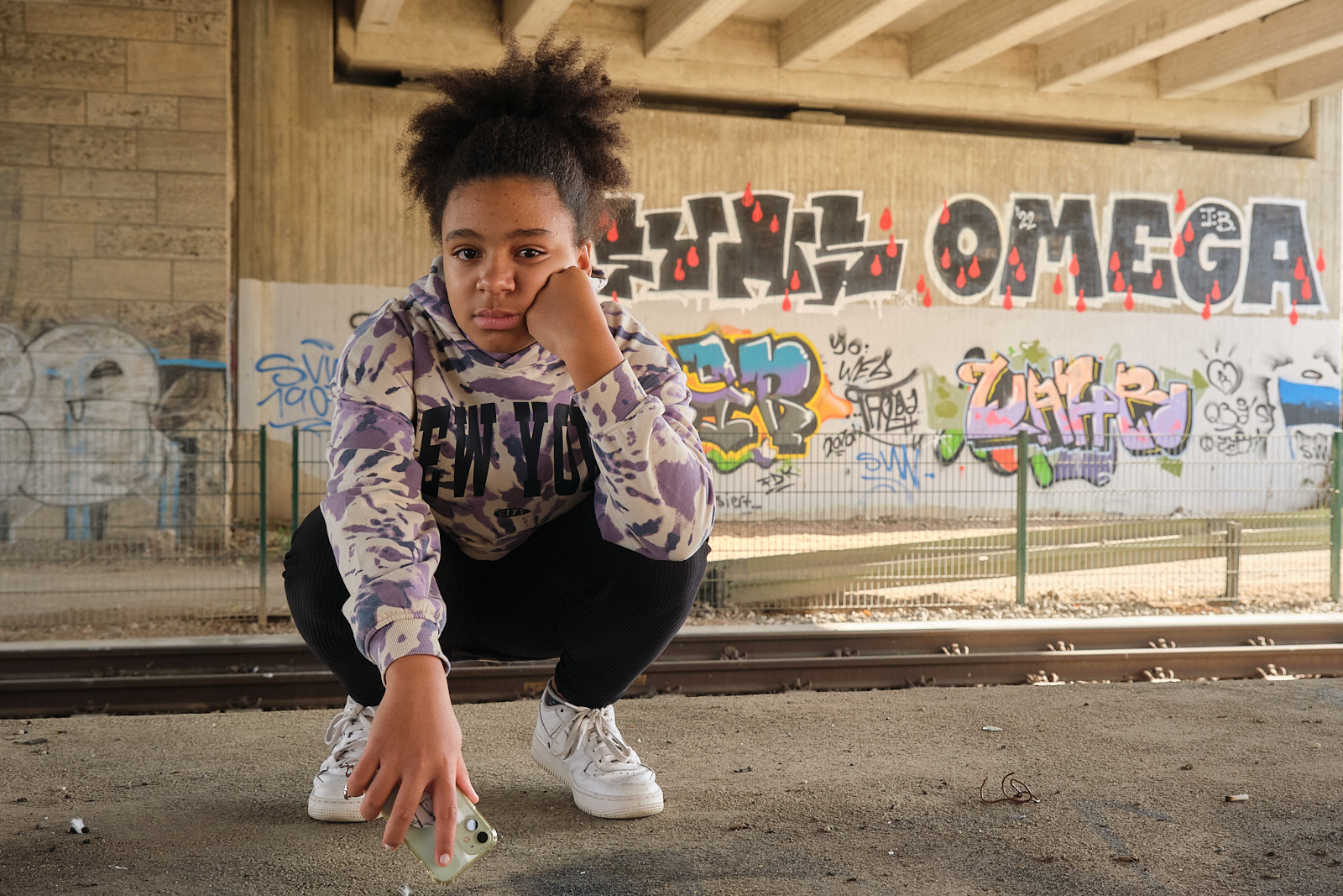 Portrait of Eliana in front of Graffiti